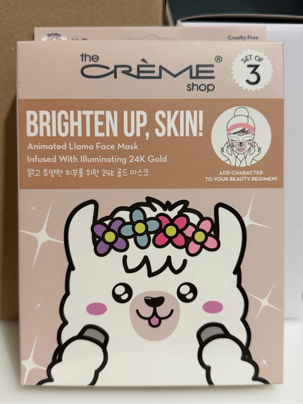 the CRÈME shop Brighten Up, Skin! Animated Llama Face Mask — Pink